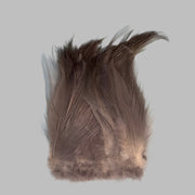 Strung neck hackle feathers, light brown-gray tuft