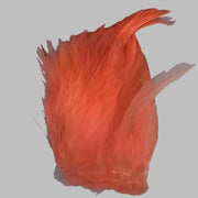 Strung neck hackle feathers, bright orange-red tuft