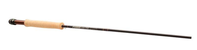 Fly rod with cork handle and dark graphite shaft, side view