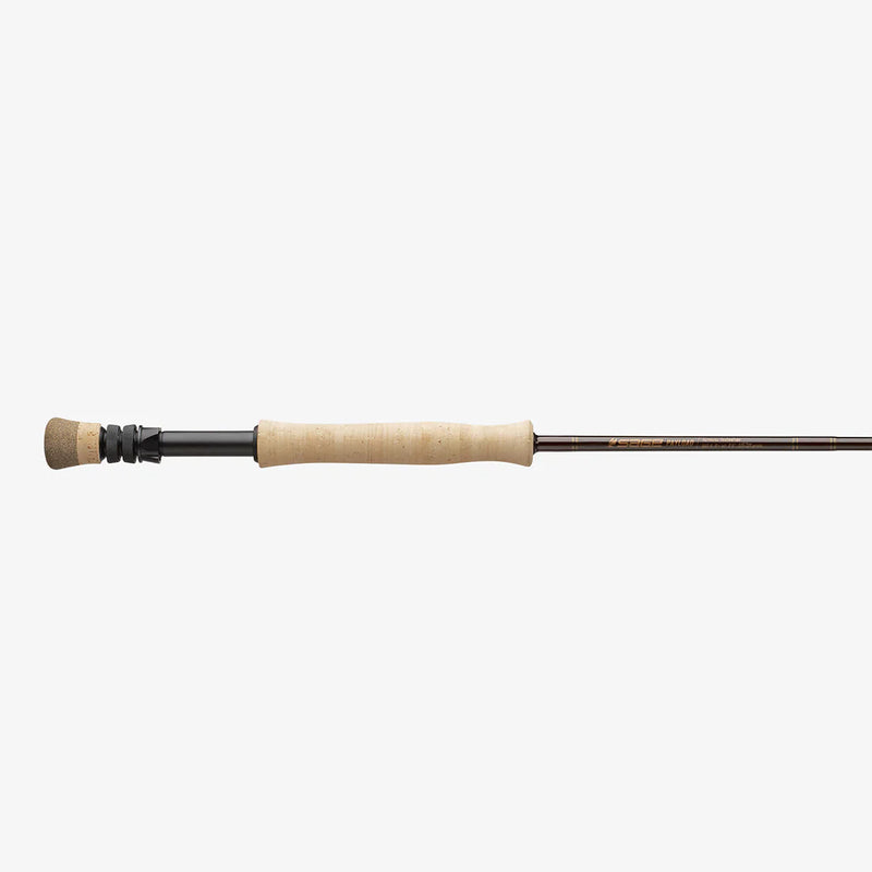 Fishing rod with cork grip and black reel seat, straight graphite blank