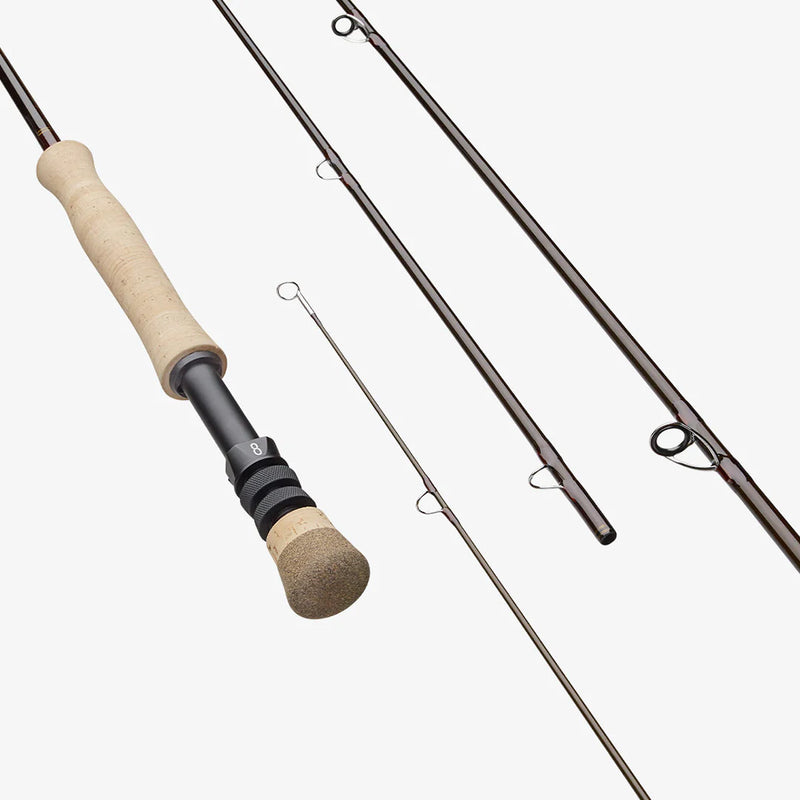 Fishing rod with cork handle and black reel seat, metal line guides
