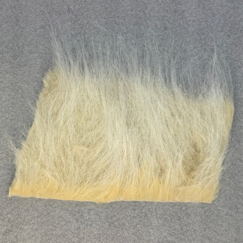 Sand-colored fur fabric swatch rectangle with dense long pile