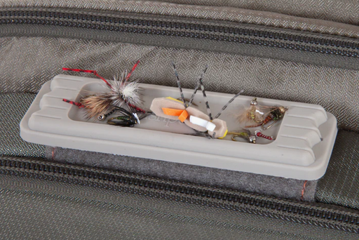 a tacky magnetic fly dock in use holding several flies