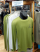 Display of long-sleeve shirts and caps in a store setting