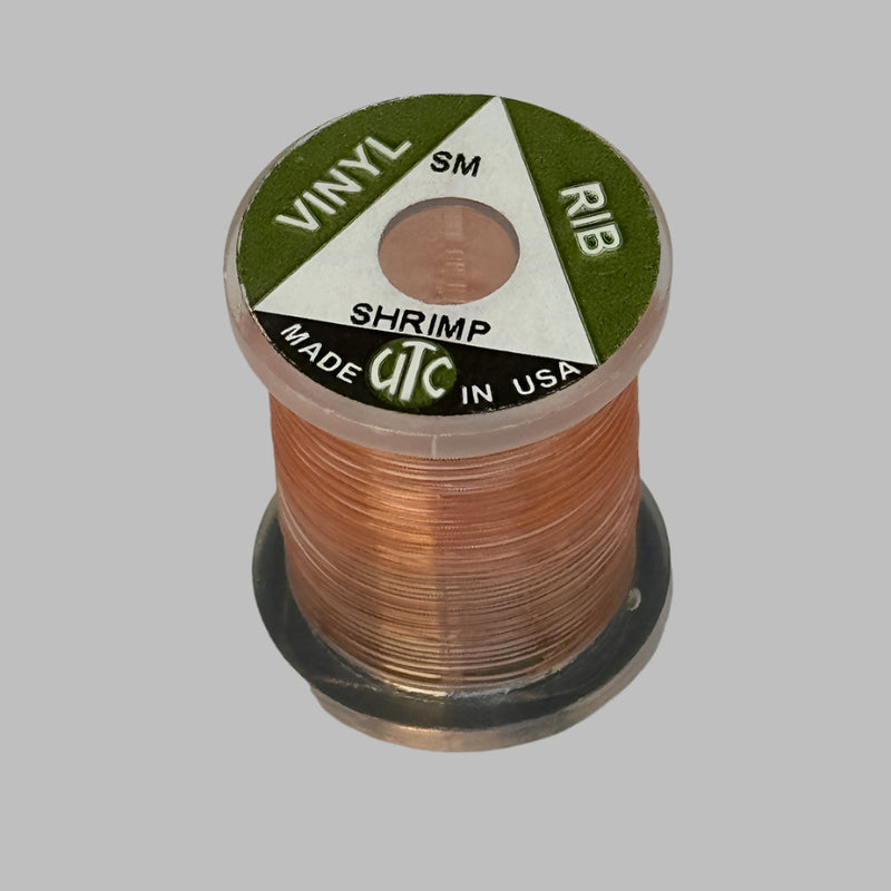 Vinyl D-rib spool of Shrimp vinyl trim, wound on a small reel