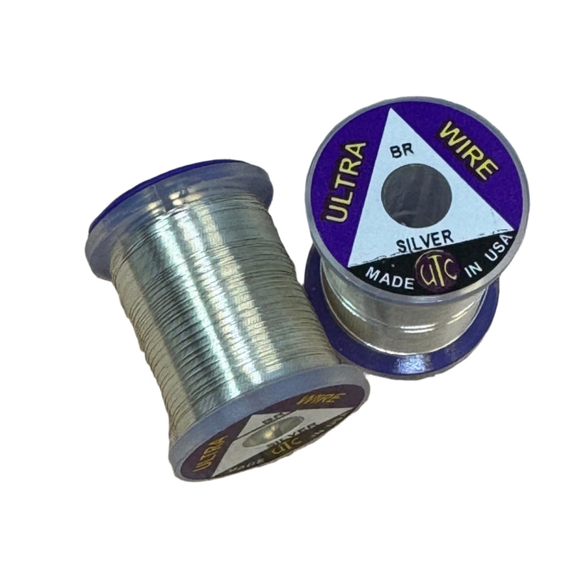 Ultra Wire spool with silver wire wound around a clear plastic holder.