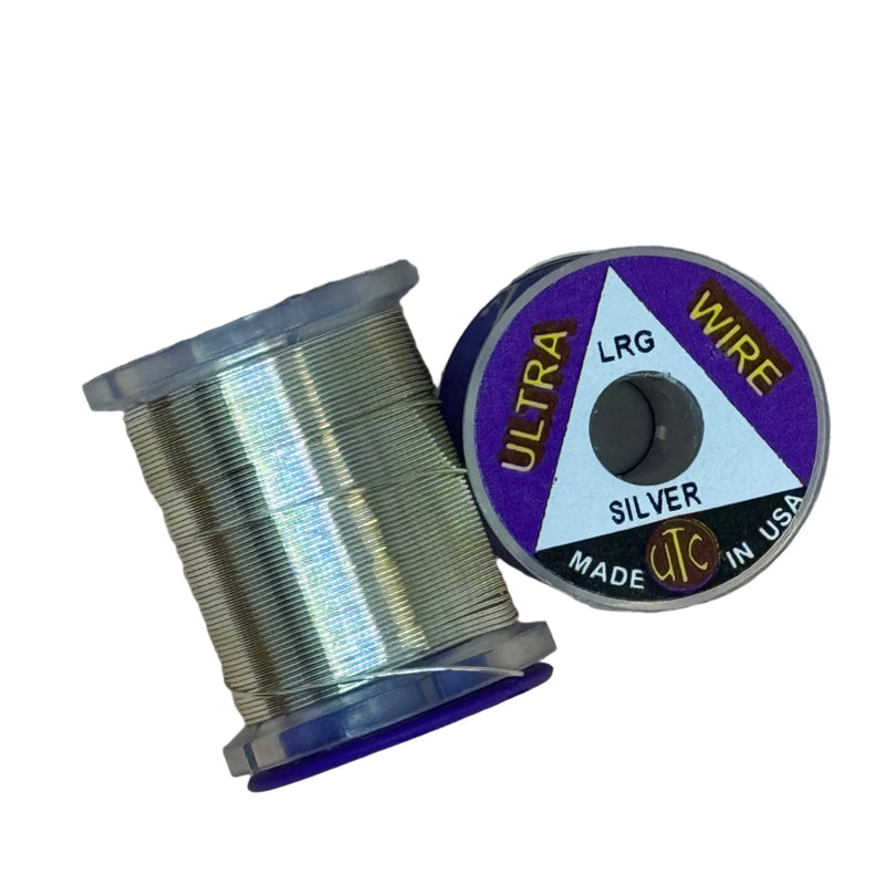 Ultra Wire spool with silver wire wound around a clear plastic holder.