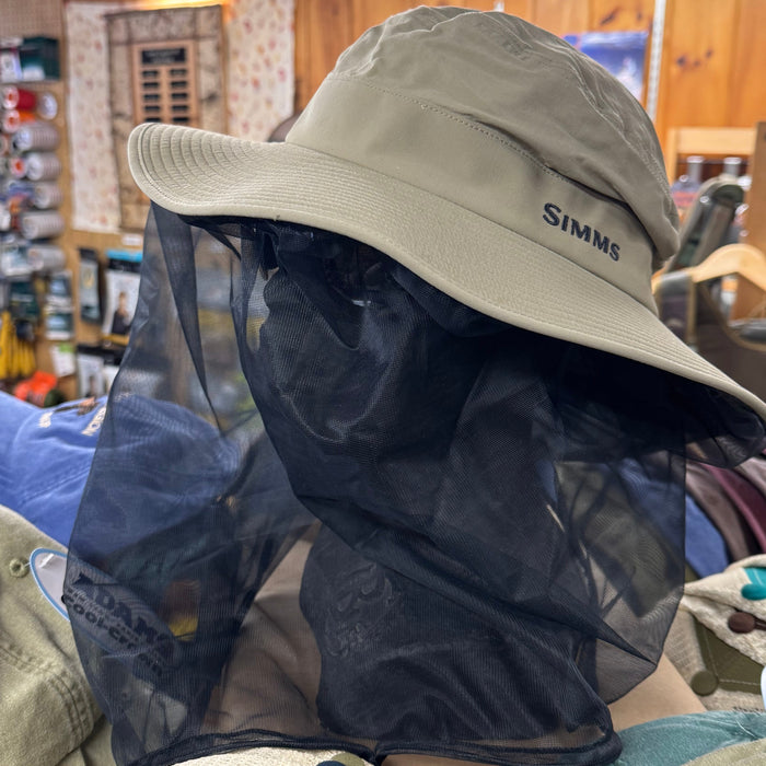 Simms hat with net displayed on mannequin head in Rangeley Region Sports Shope