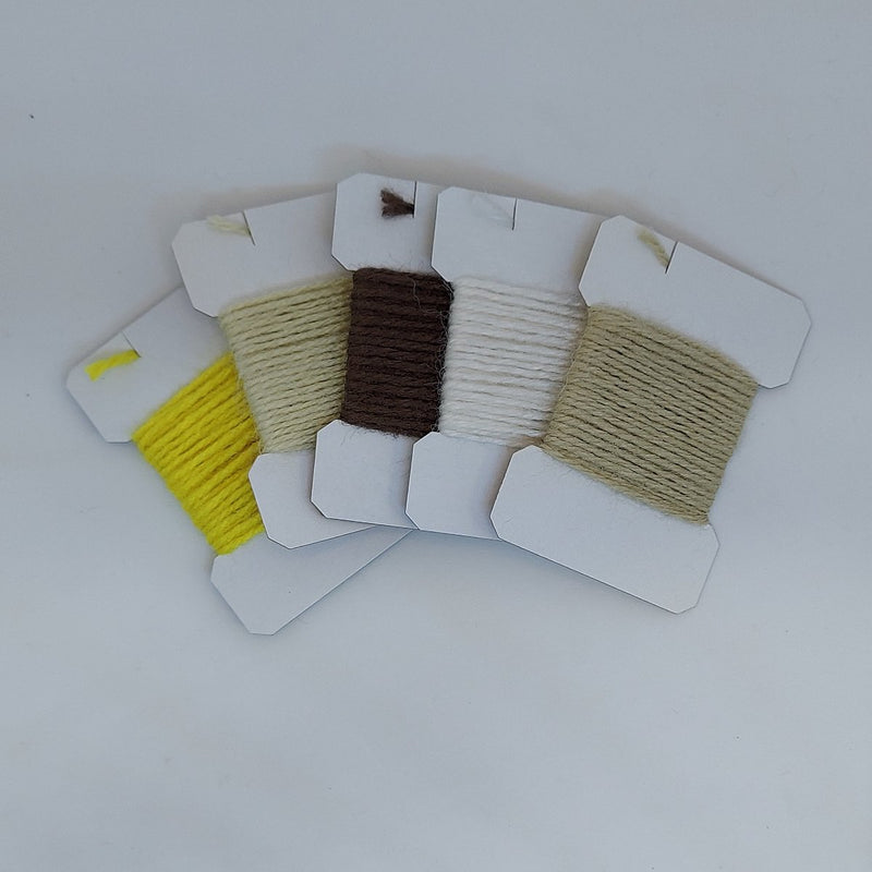 Sparkle yarn sampler set with yellow, brown, white, sand and cream spools