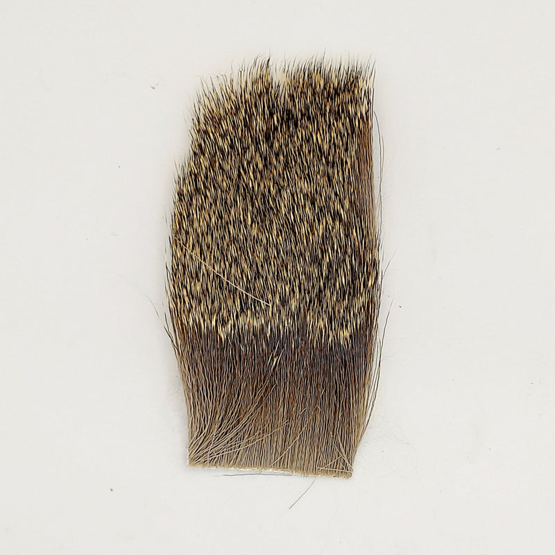 Deer hair stimulator by Nature's Spirit, rectangular brown and tan hair pad.