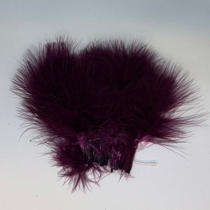 Close up of strung, wine colored marabou feathers