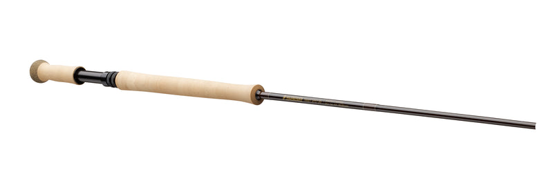 Spey fishing rod with cork handle, dark shaft, and line guides