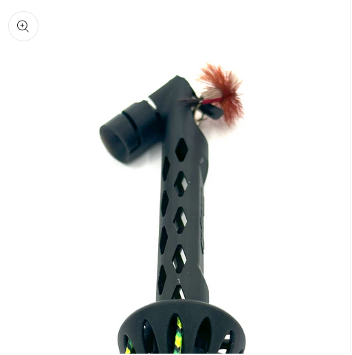 The Talweg Fly Roost tool with a tan and red fly positioned to be tied on a leader