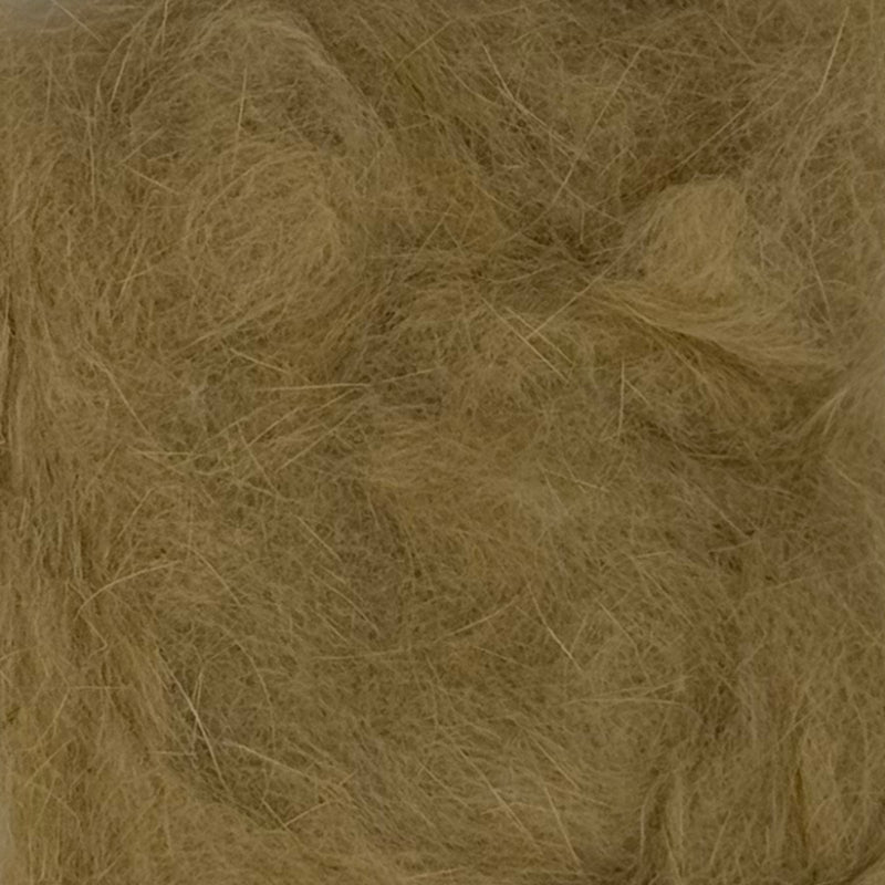 Rabbit dubbing material in tan, fine shaggy fiber surface.