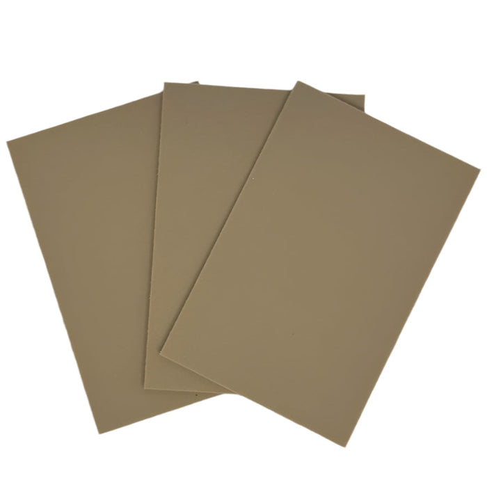 three sheets of 1 mm tan foam for creating fishing flies