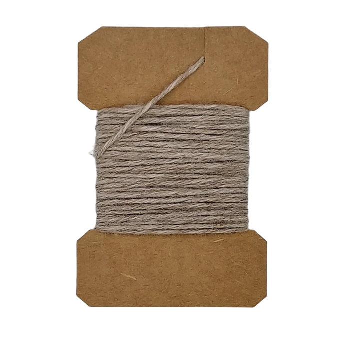 a card of tan wool yarn for fly tying