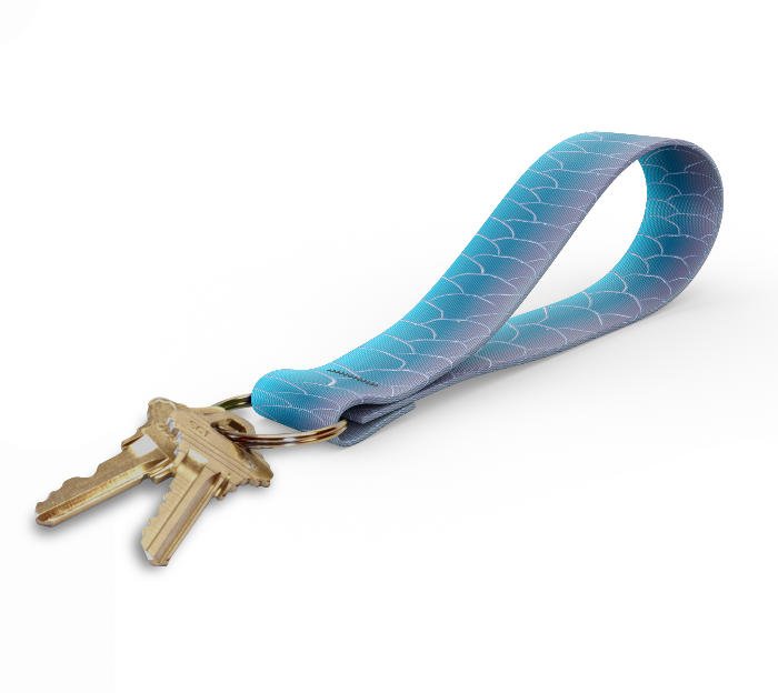 Key fob with blue wave-pattern strap and gold keyring, keys attached
