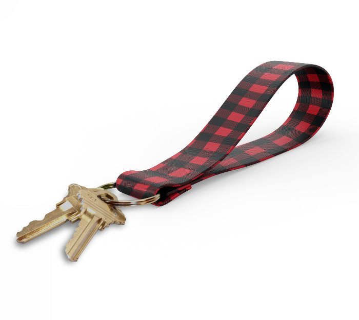 A key fob with a red buffalo check pattern