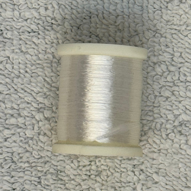 Four-strand floss spool in silver-white