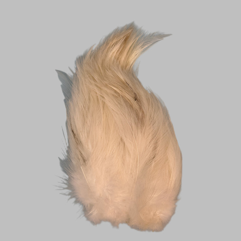 Strung neck hackle feathers, light tan/cream with soft wispy fibers