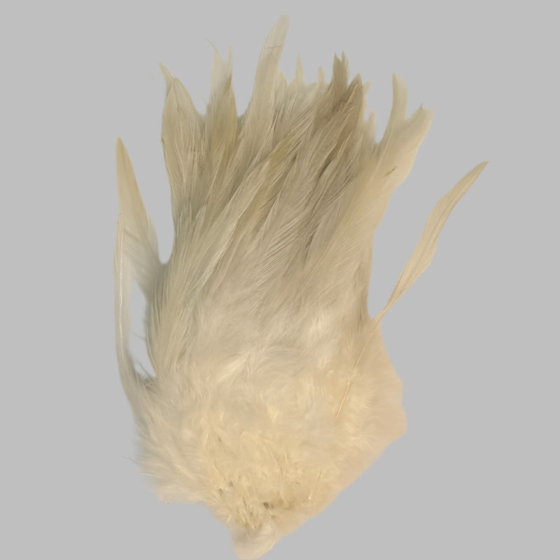 Strung rooster saddle feathers, light cream with soft barbs and quills.