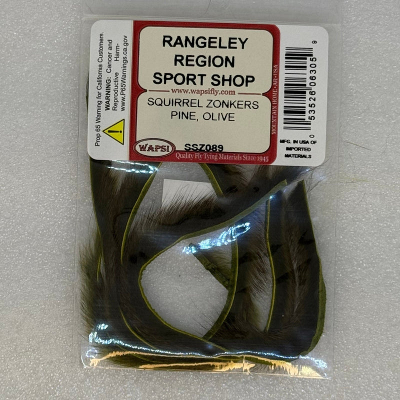 Packed squirrel zonkers with dark green and brown fur tufts in plastic bag