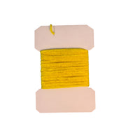 Fine rayon chenille thread spool in yellow with top and bottom pads
