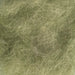 Close up of watery olive colored dubbing