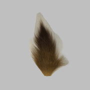 Medium bucktail tuft, tan with darker underside