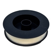 Fly line backing spool with off-white line wound on dark gray/black reel