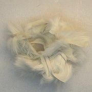 Crosscut rabbit fur strands in off-white
