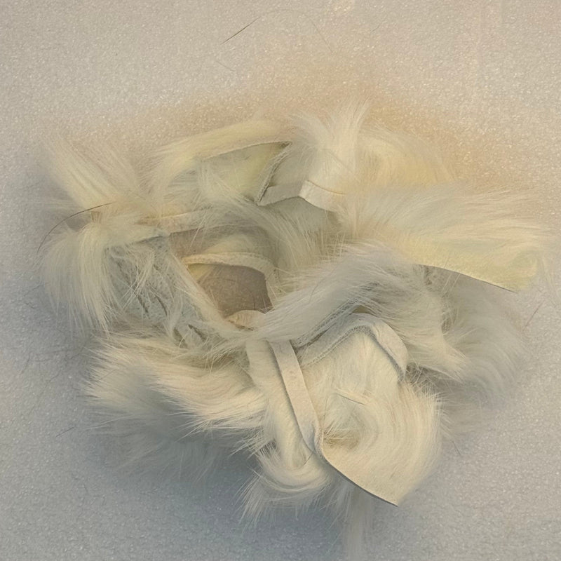 Crosscut rabbit fur strands in off-white