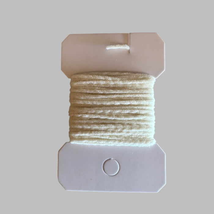 White colored ultra chenille wrapped around a card