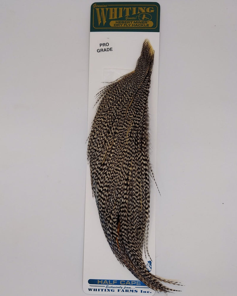 Grizzly half cape of miner feathers with speckled black-and-tan pattern