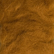 Rabbit dubbing material in warm brown, dense shaggy fibers.