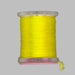 Close up spool yellow Antron yarn