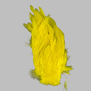 Fluorescent yellow strung schlappen feathers with pointed tips