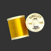 Waxed flymaster plus thread spool in golden yellow, with printed label