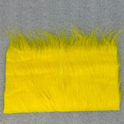 Yellow fur fabric swatch rectangle with dense long pile