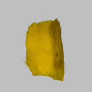 Deer belly hair piece in yellow