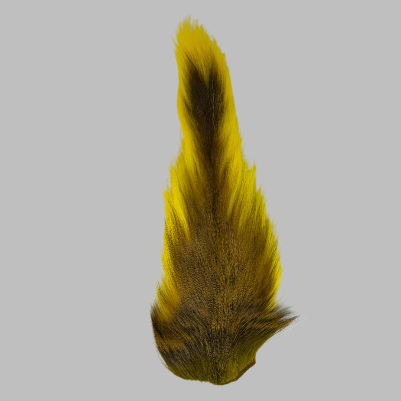 Medium bucktail tuft, bright yellow with dark center