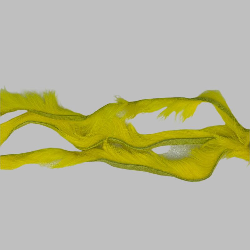 Zonker strips in neon yellow, long wavy fur strip with bright greenish highlights