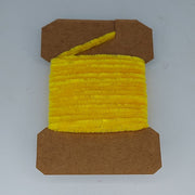 Medium rayon chenille yarn spool in yellow with ribbed fuzzy texture