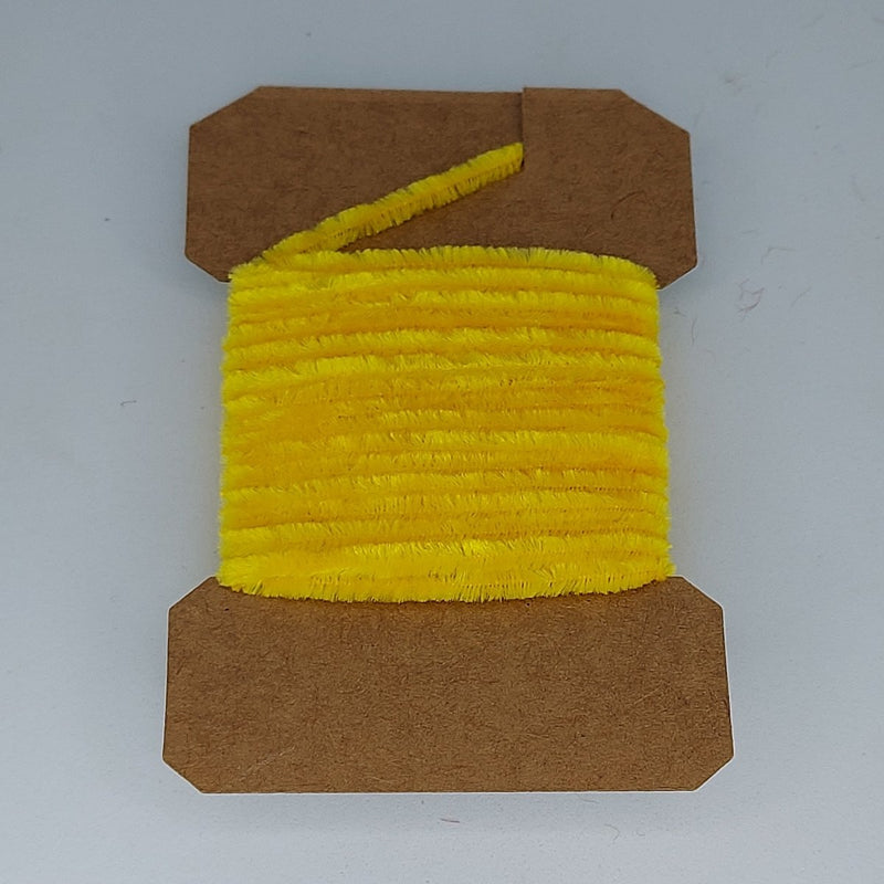 Medium rayon chenille yarn spool in yellow with ribbed fuzzy texture