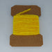 a card of yellow chenille