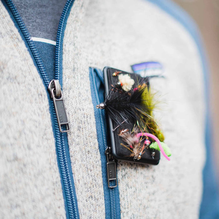 fly caddy in use clipped on someone's vest