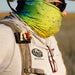 fly patch in use clipped to someone's pack strap