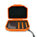 Orange fly box with black interior on a white background
