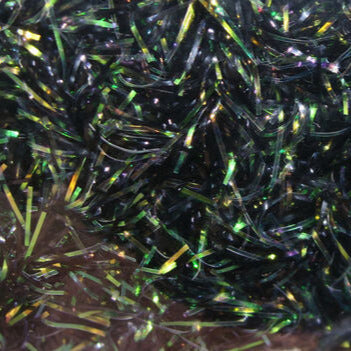 Chenille tinsel material swatch with dark fibers and green metallic sparkle