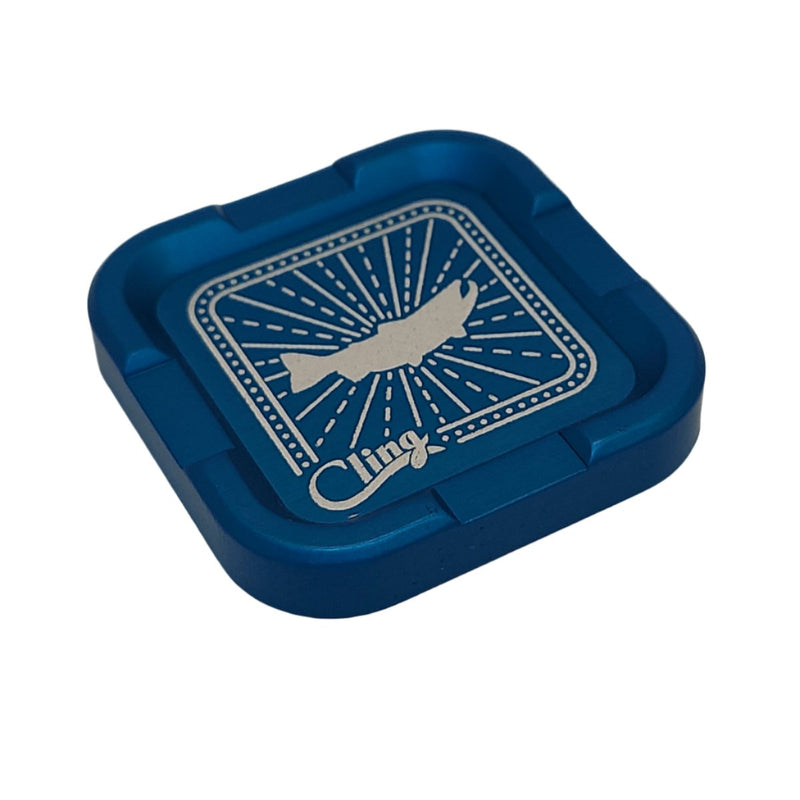 Cling Mag Grab in blue square tray with butterfly graphic and Cling logo